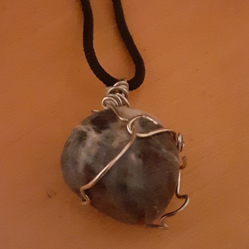 Blue and White Stone on a Black leather cord